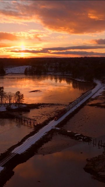 Have you ever been at the right place at the right time by accident? Well I sure did at this spot. Not only did I not plan on stopping here, but I definitely didn't plan on arriving right at sunset when a train was scheduled to go by! Amazing.